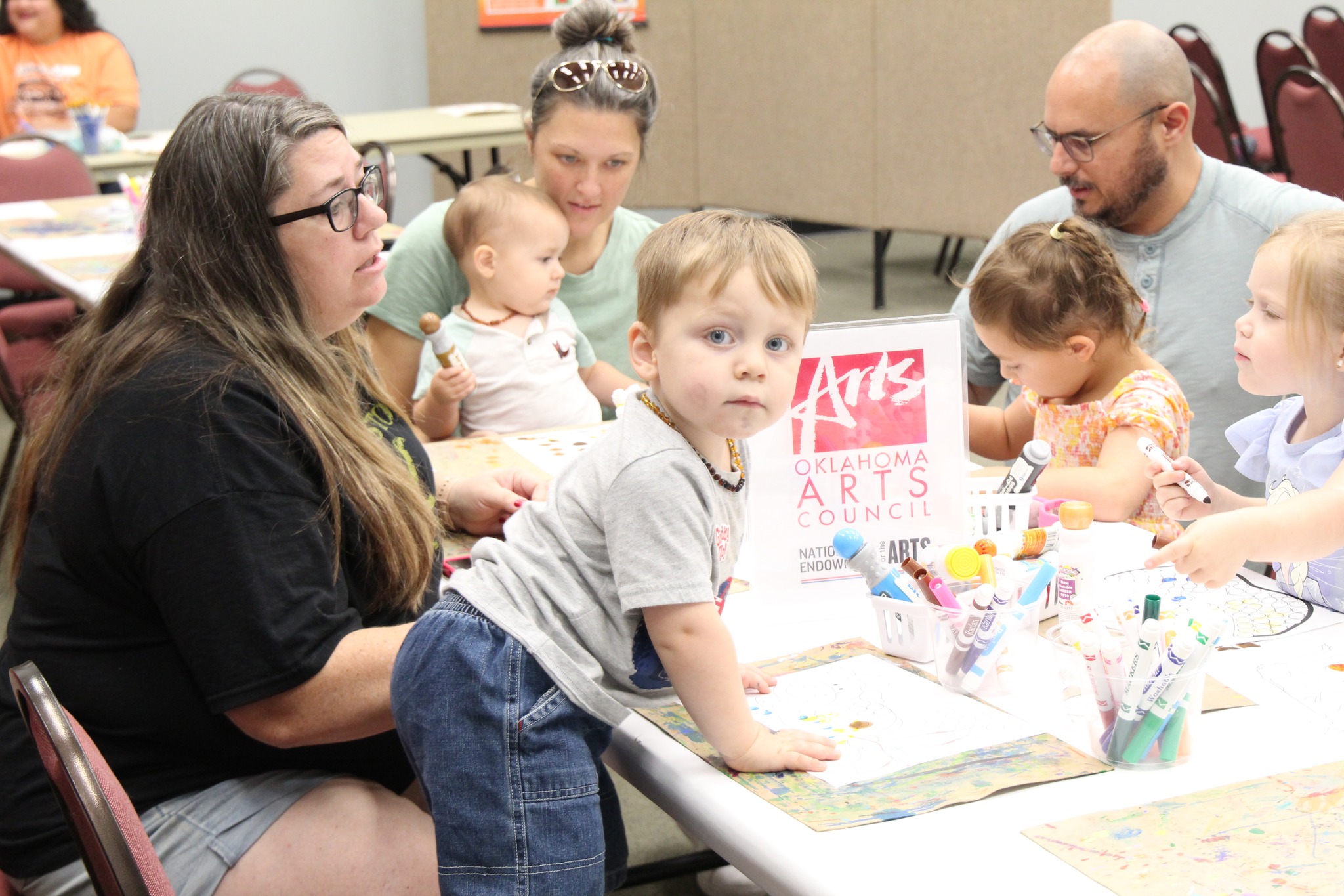 Photo of families creating artwork together