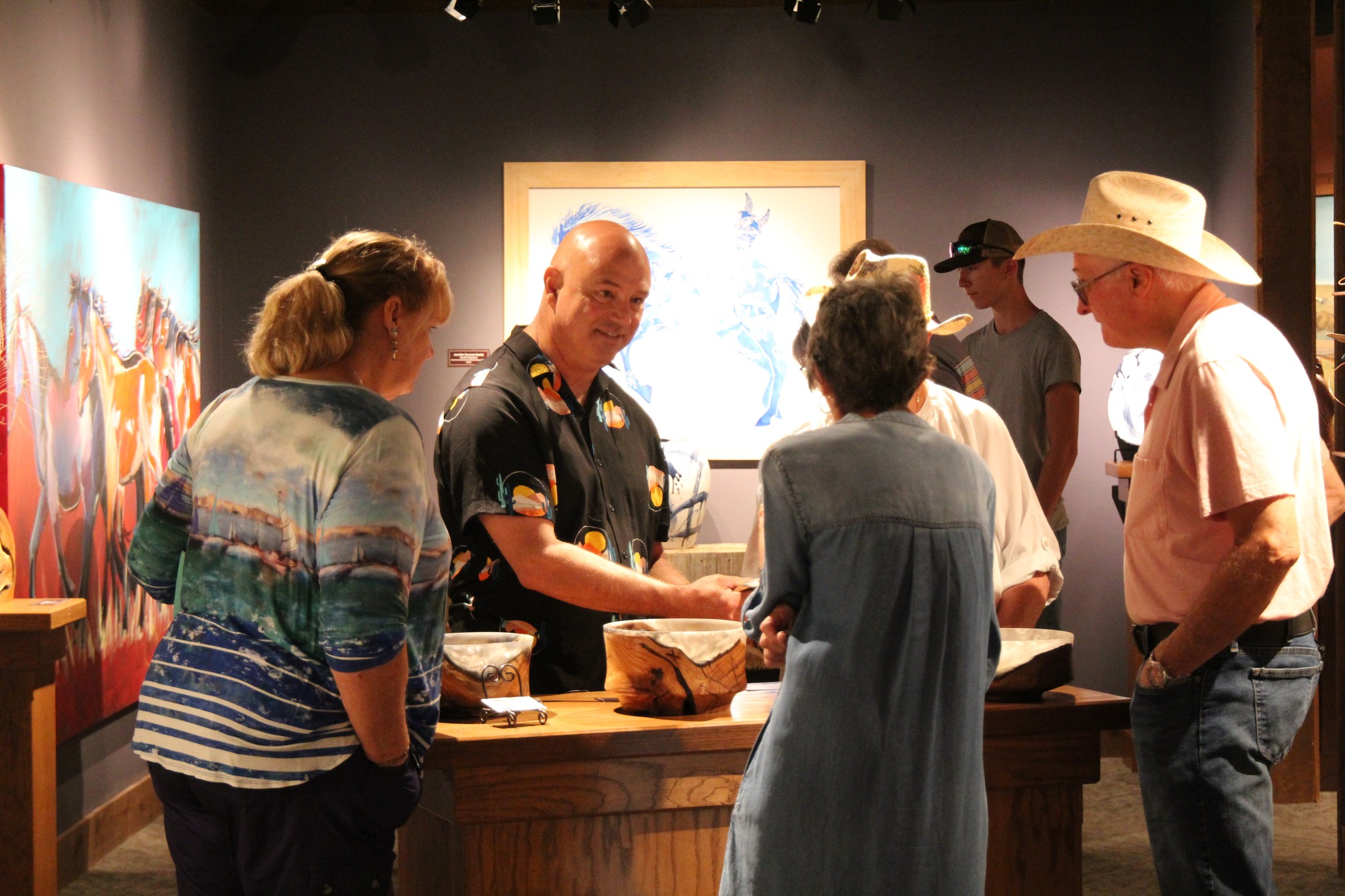 Photo of visitors admiring the exhibit