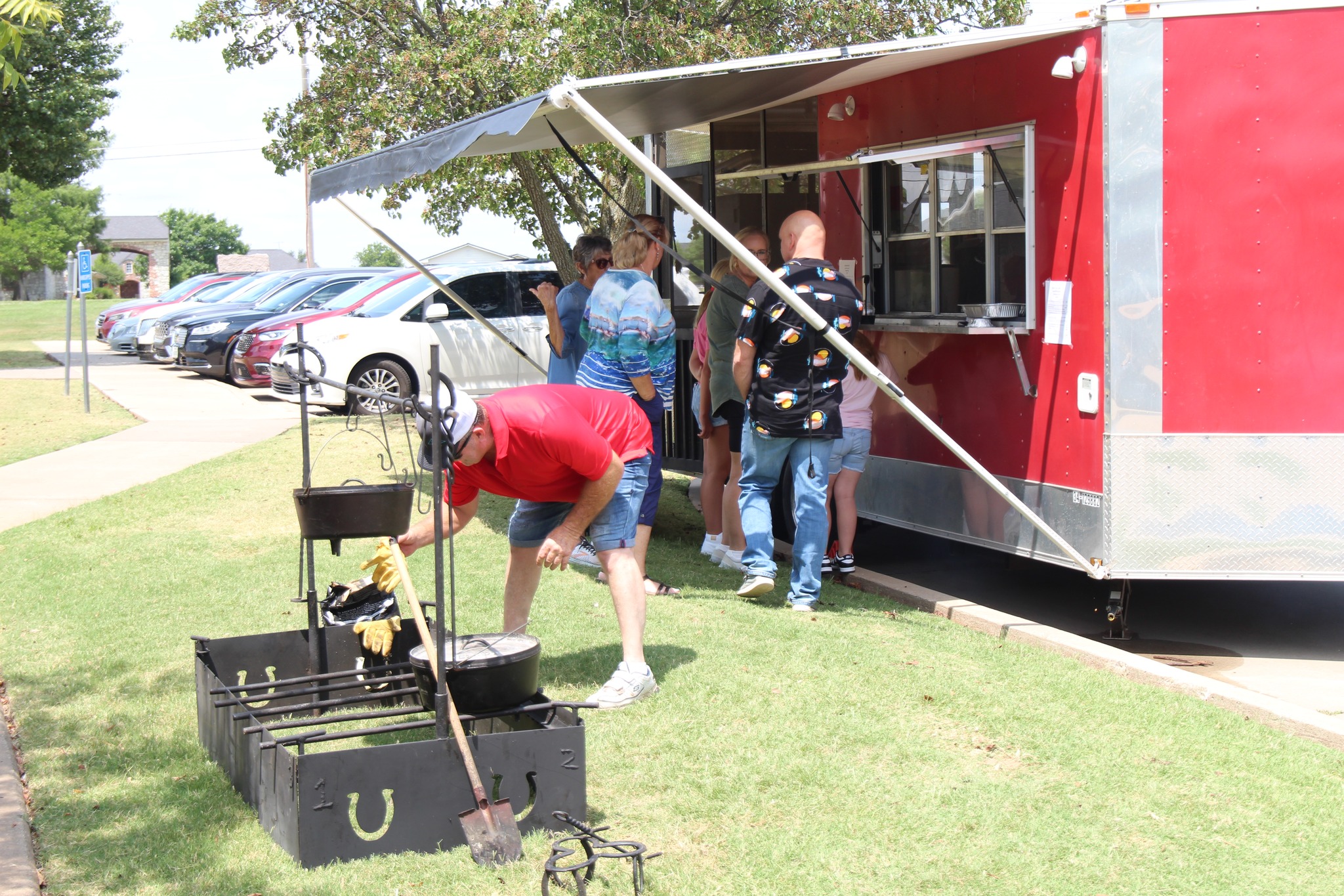 Photo of visitors enjoying a food truck