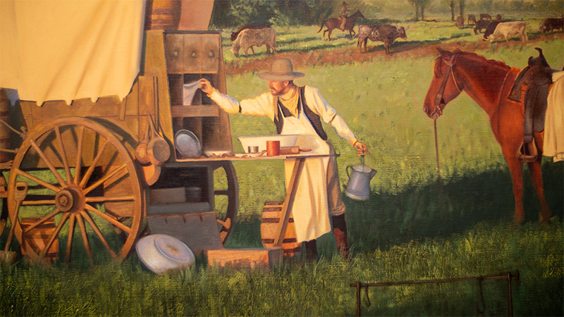 Cookie getting a meal ready for the hungry cowpokes