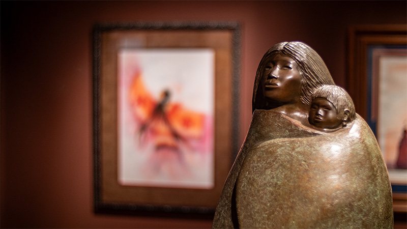 Mother and child bronze statue